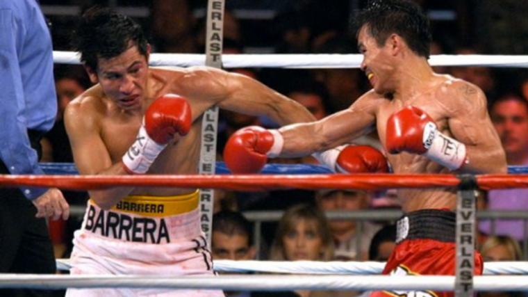 Manny Pacquiao attacks Marco Antonio Barrera